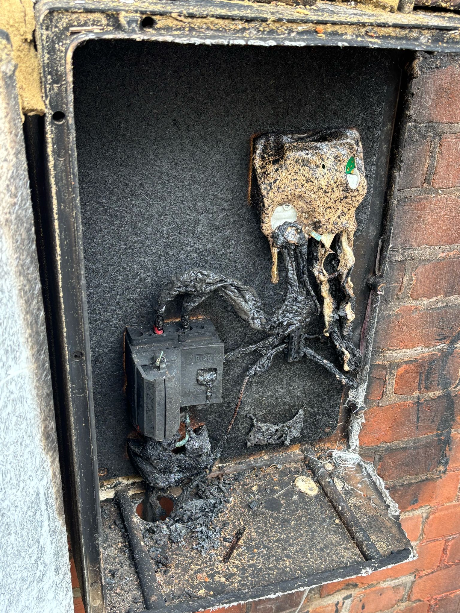Burnt electrical service head caused house fire — no EICR for 30 years. Why electrical inspections are essential — MN Electrical London