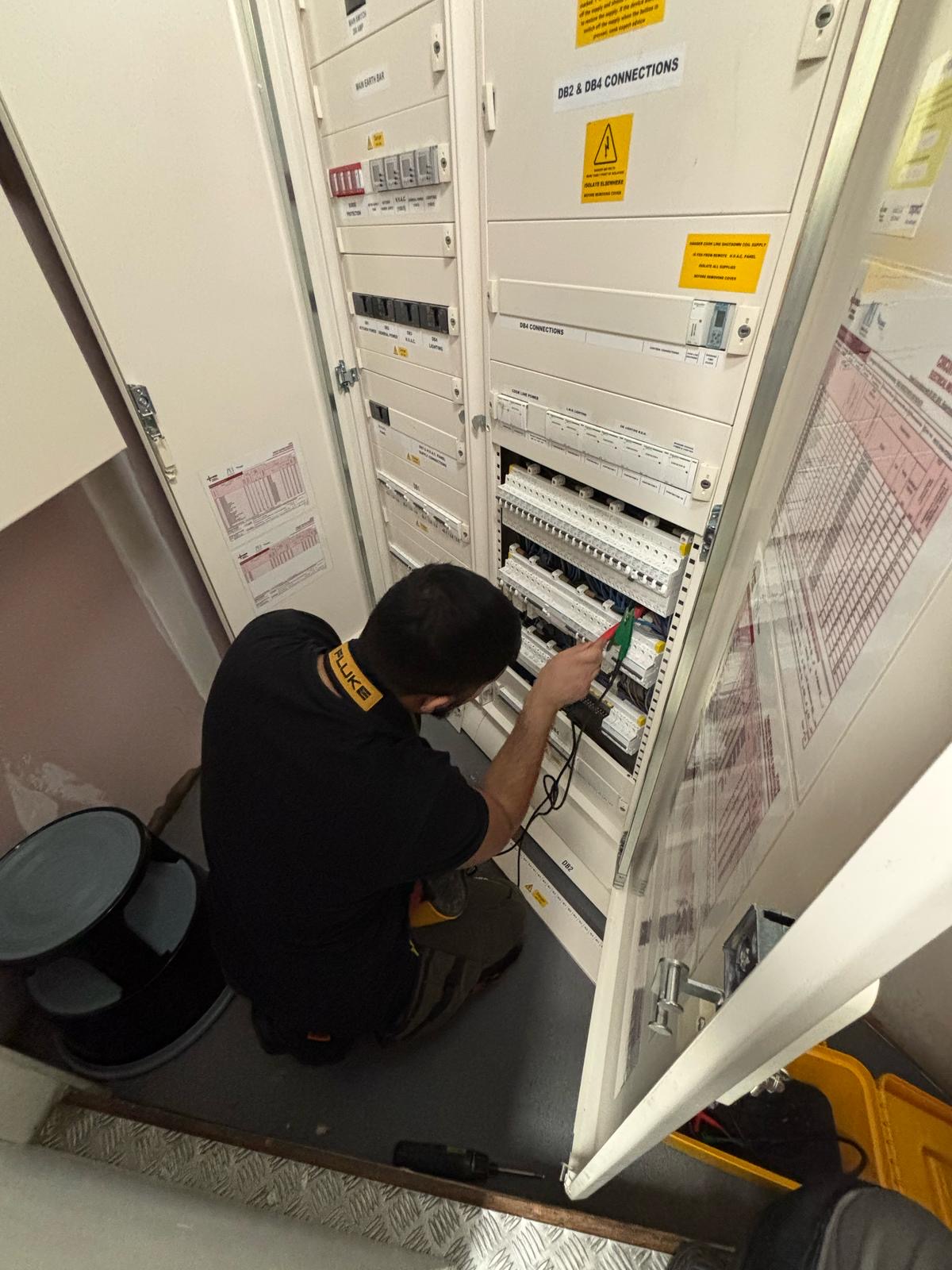 MN Electrical engineer testing commercial distribution board at Nobu Restaurant London using Fluke professional test equipment
