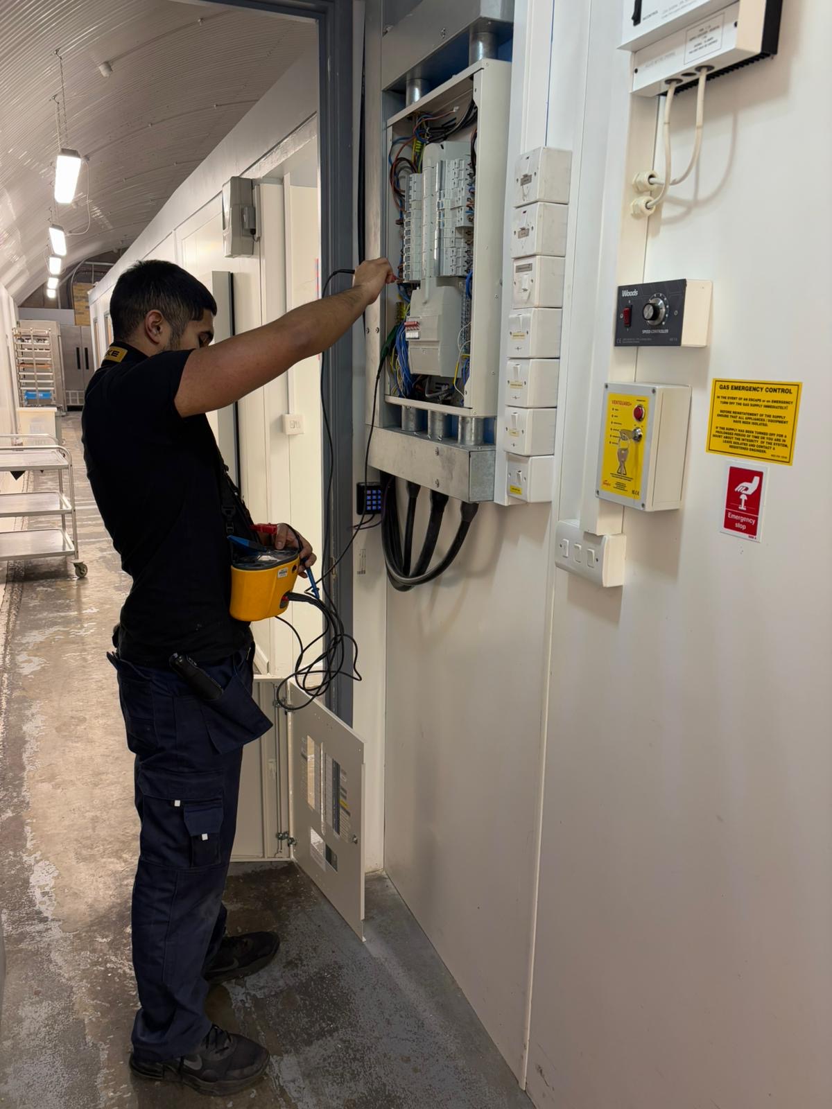 MN Electrical conducting full commercial EICR at a London bakery — professional Megger electrical test equipment, commercial inspection